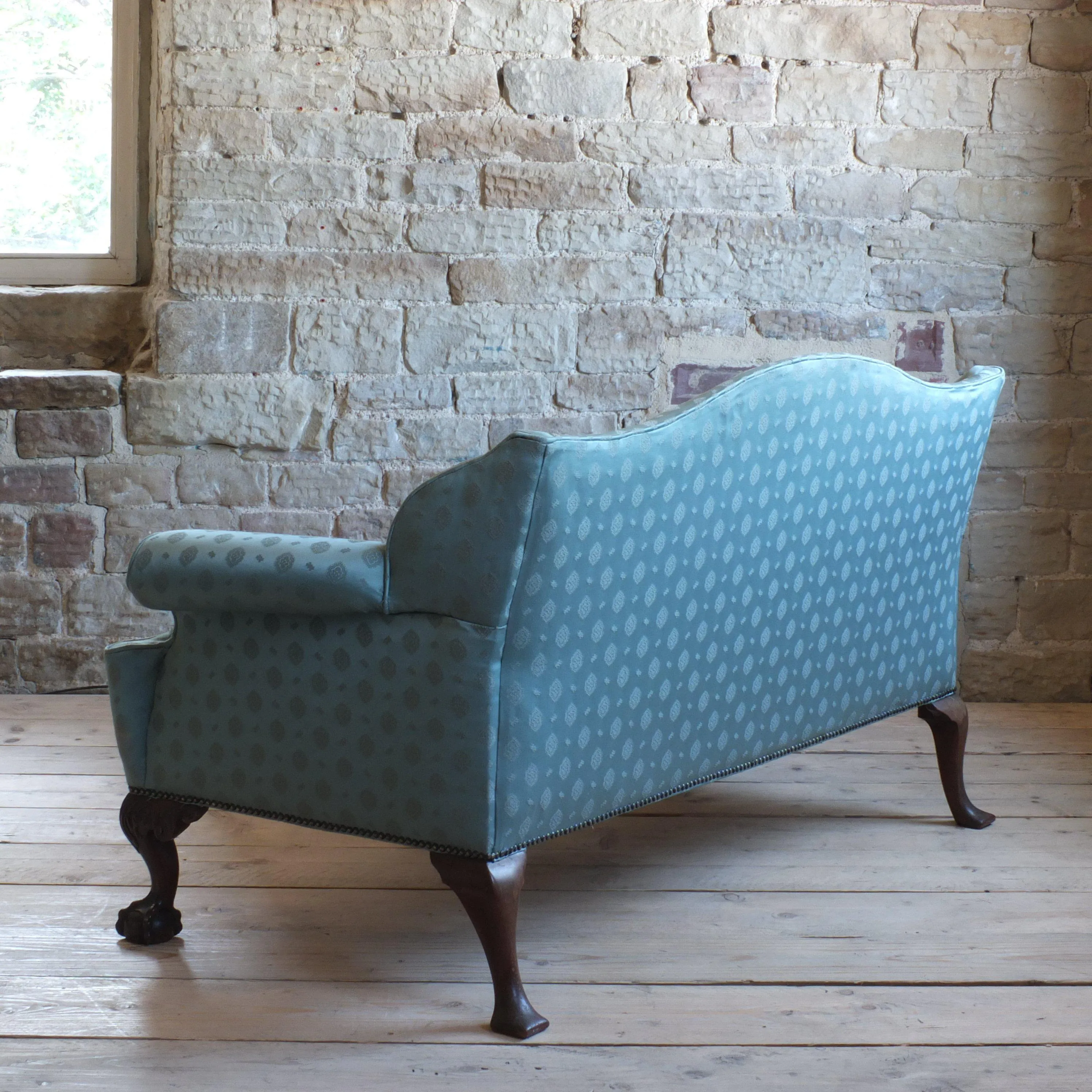 Early 20th century country house camel back sofa