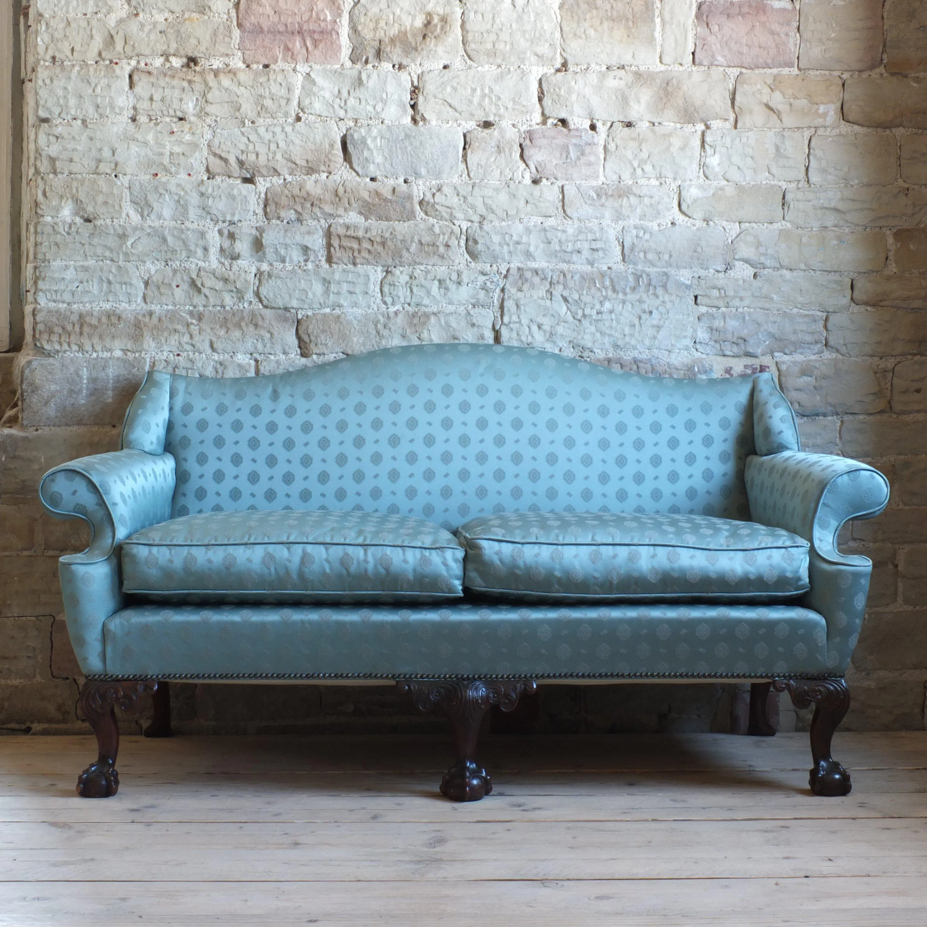 Early 20th century country house camel back sofa