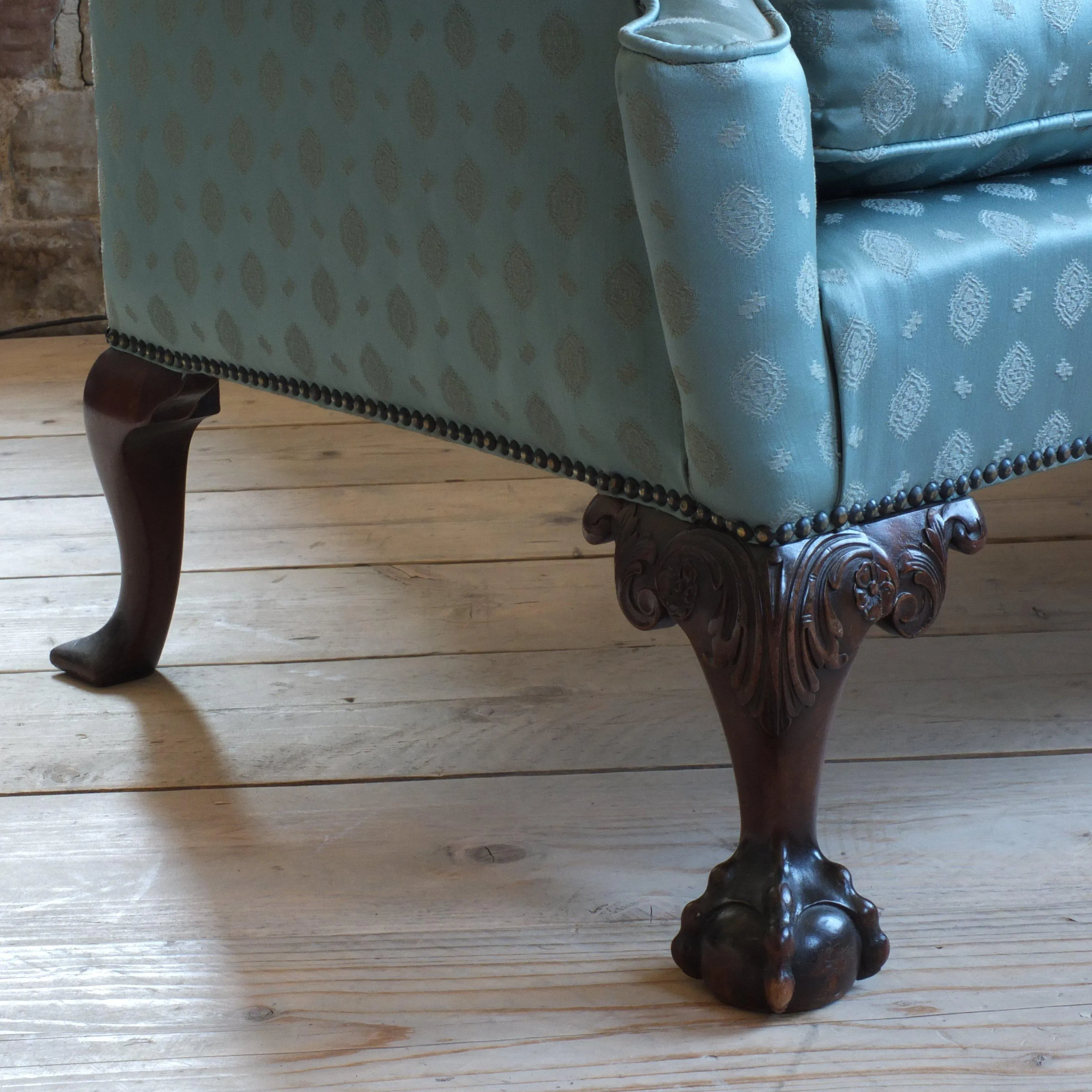 Early 20th century country house camel back sofa