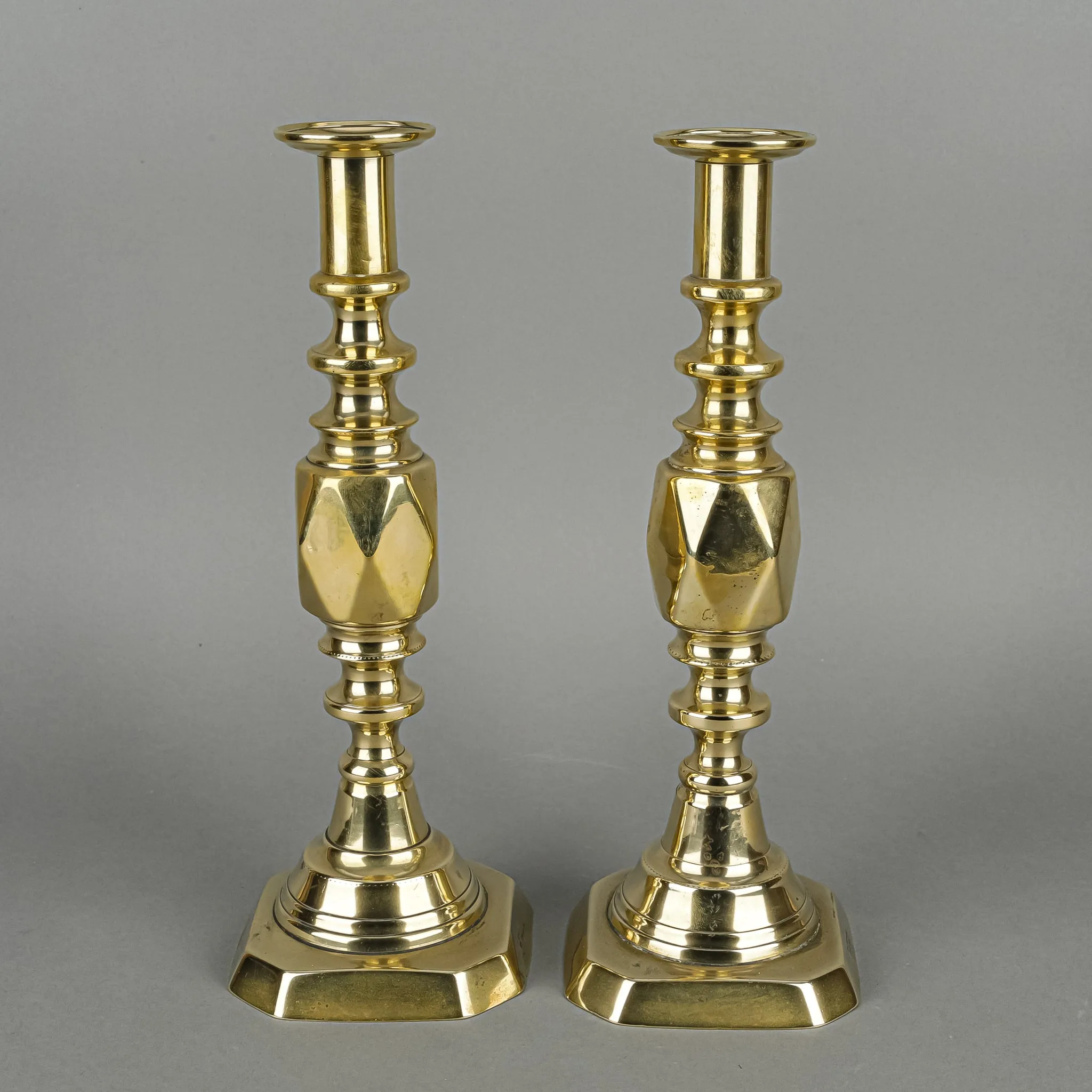JAMES CLEWS & SONS 'Diamond Prince' Brass Candlesticks