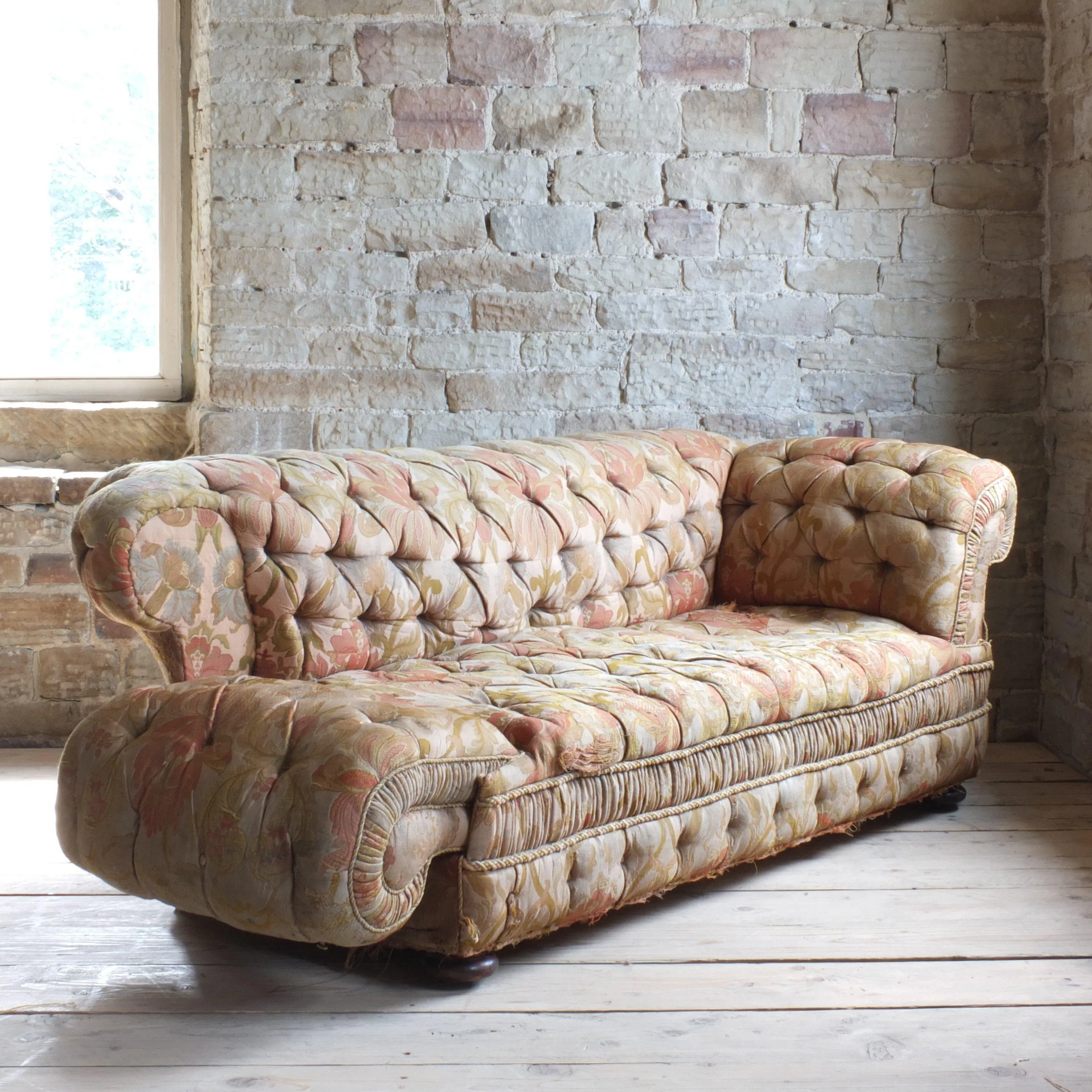 Victorian double drop arm chesterfield sofa by Charles Jenner & co