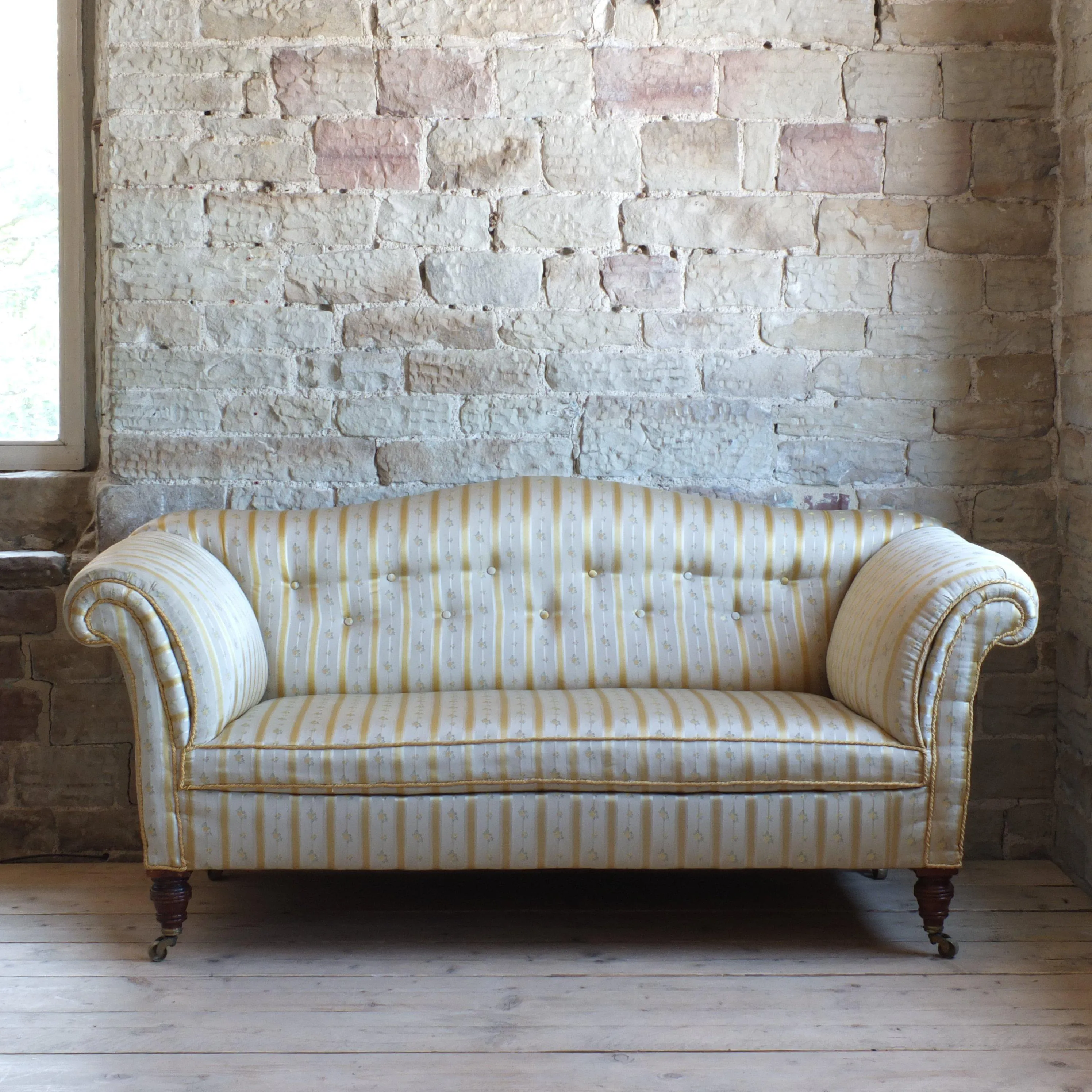 Victorian Howard style camel back sofa