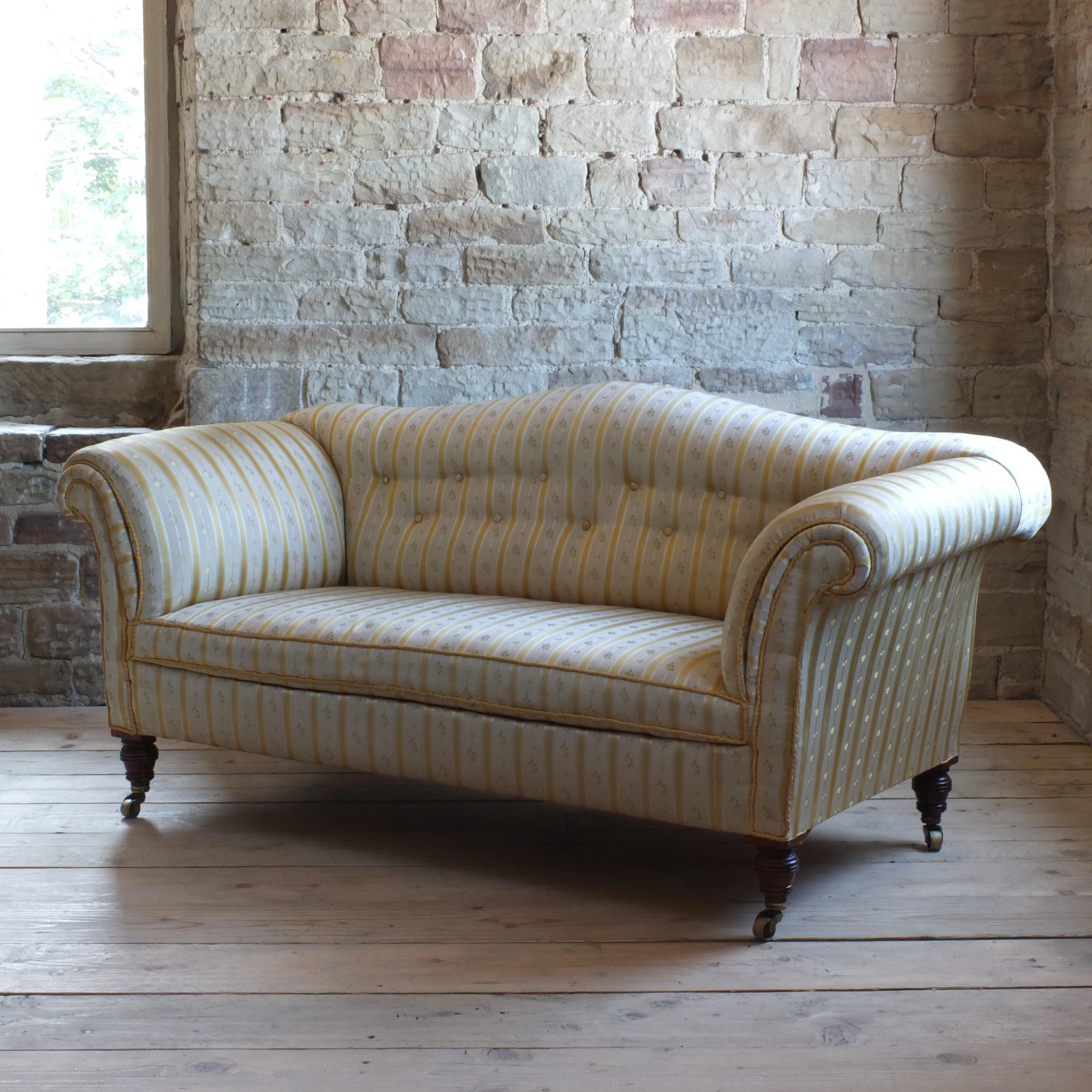 Victorian Howard style camel back sofa