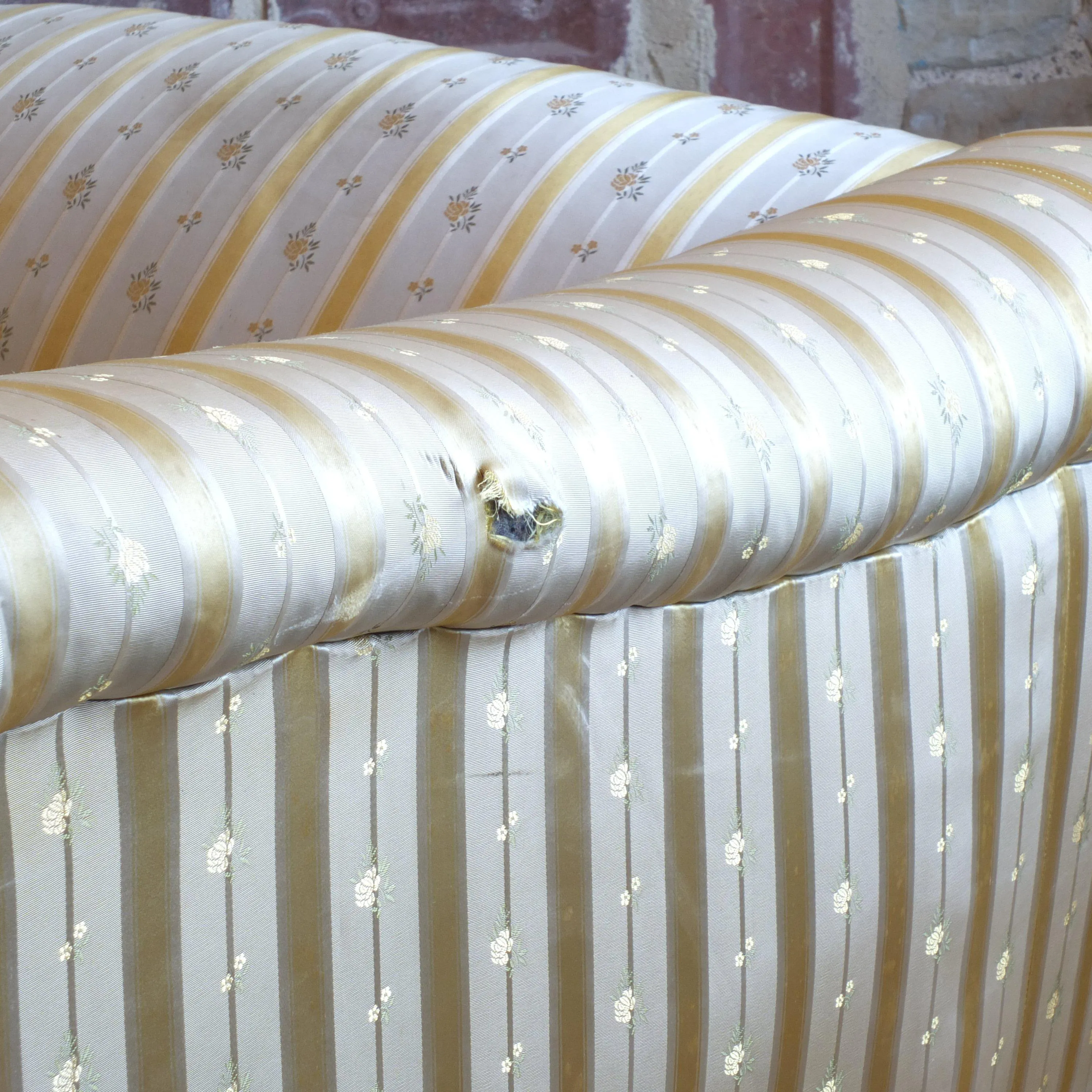 Victorian Howard style camel back sofa
