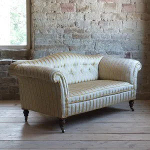 Victorian Howard style camel back sofa